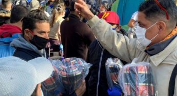 Seeking to return home, Venezuelan & Peruvian migrants camp outside embassies in Chile