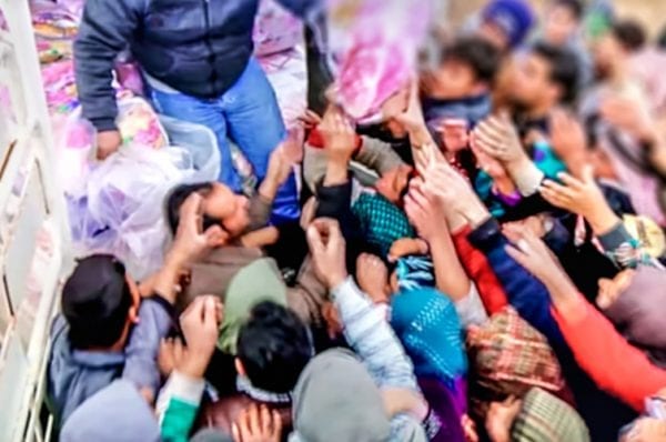 The refugees migrant were begging for food