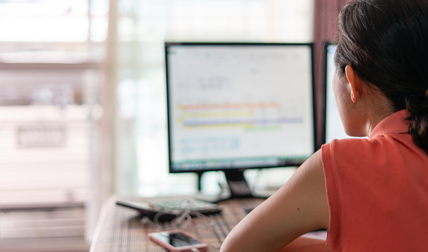 Woman working her job from home by using computer connect to her office