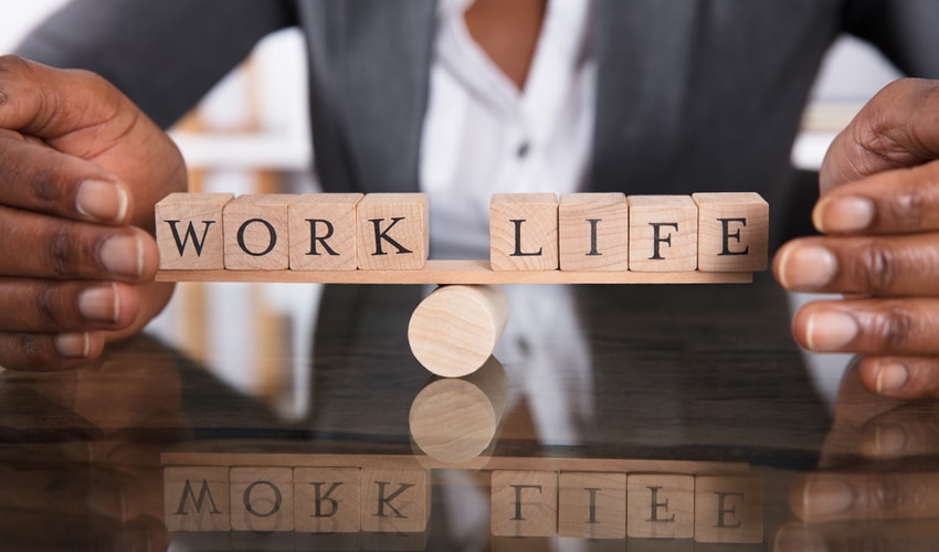 Close-up Of A Businesswoman's Hand Covering Balance Between Life And Work