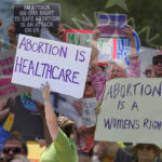 activists protest against proposed indiana abortion law