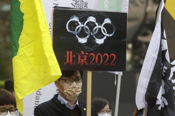 activists urge athletes to speak against human rights abuse at winter olympics 2022