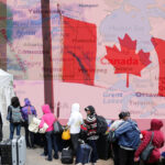 advocates urge canada to grant permanent status to migrants