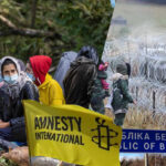 amnesty accuses latvia of abusing migrants on belarus border
