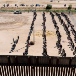 an agency originally created to combat terrorism now has to care for migrants too