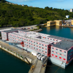 asylum seekers board uk’s controversial ‘deathtrap’ housing barge