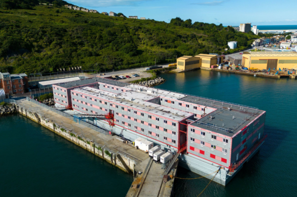 asylum seekers board uk’s controversial ‘deathtrap’ housing barge