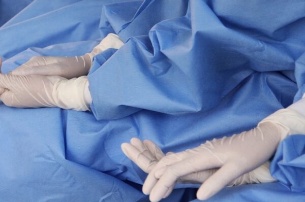 banned rubber gloves used in parliament shows double standards of government