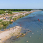 biden administration files lawsuit against texas over anti migrant floating border barriers