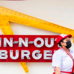 cheeseburgers with a smile in n out burger enforces no mask, all smiles policy for employees