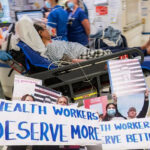 during a strike at major sydney hospitals, healthcare workers accuse the premier of lying about a pay rise