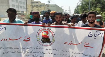Textile workers protest outside their company as they demand for minimum wages