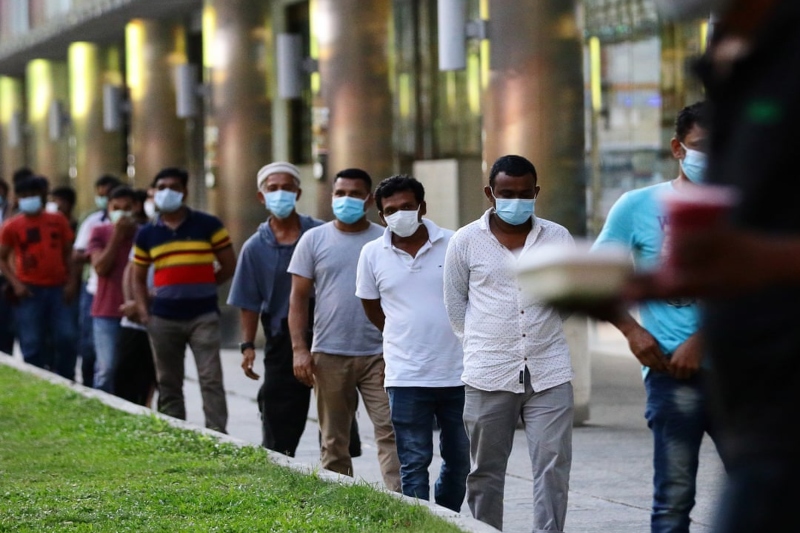 group of migrant workers trained to spot distress & anxiety signs in fellow migrants