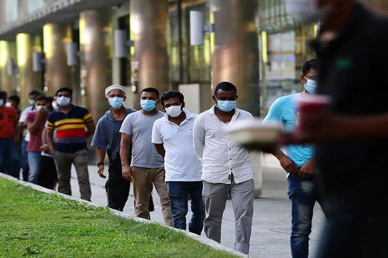 Health and living conditions of migrant workers ignored in Singapore