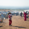 humanitarian crisis unfolds in lebanon as scores of people seek refuge in syria