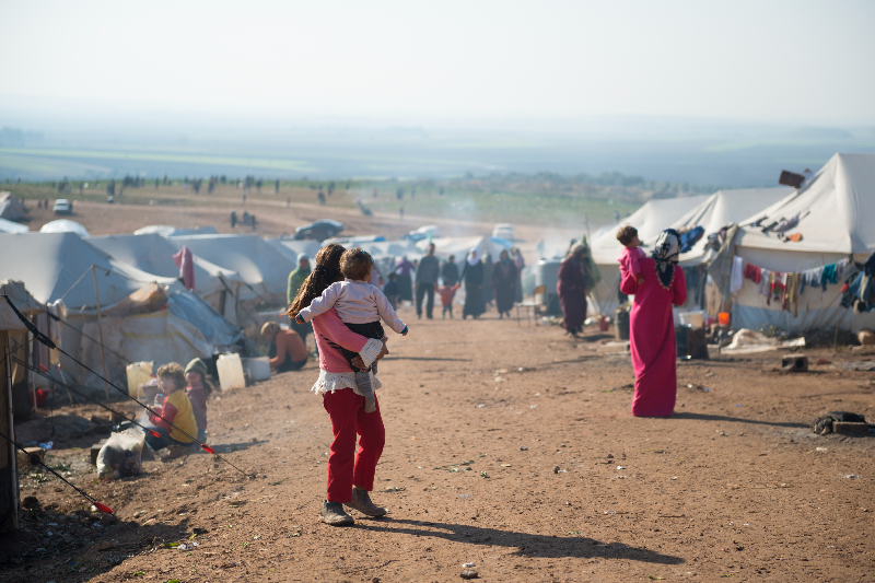 Humanitarian Crisis Unfolds in Lebanon as Scores of People Seek Refuge in Syria