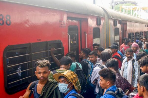 journey with migrants in an unreserved coach