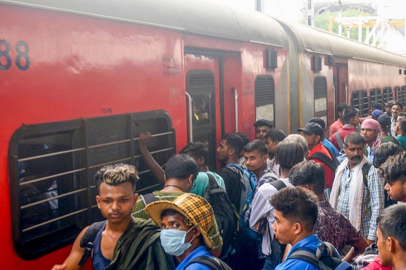 journey with migrants in an unreserved coach