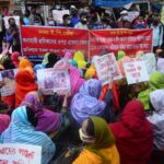 labor leaders took out a rally to approve full wage & festival allowance for dhaka factory workers