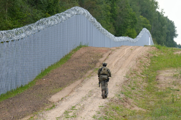 latvia border guard claims belarus is 'coordinating' irregular migrant crossings