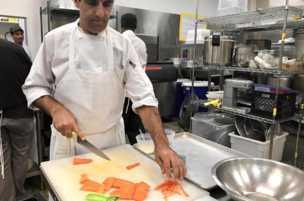 migrants put into restaurant work placement program in new york