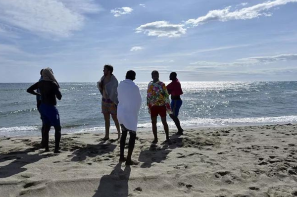 migrants in france learn to swim and overcome their crossing