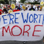 more than 10,000 workers protest in us demanding fair pay and healthcare provision