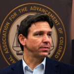 naacp issues travel advisory for ‘openly hostile’ florida