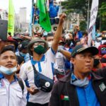 scores of workers protest against omnibus jon creation law in indonesia