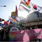 south korean city officials clash with police at protest against lgbtq festival