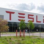 tesla alters employee compensation strategy