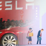 tesla set for another round of layoffs in early 2023, pauses hiring
