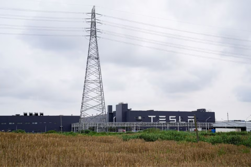 tesla starts to lay off workers at china factory
