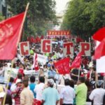 workers protest to demand an increase in minimum wage in peru